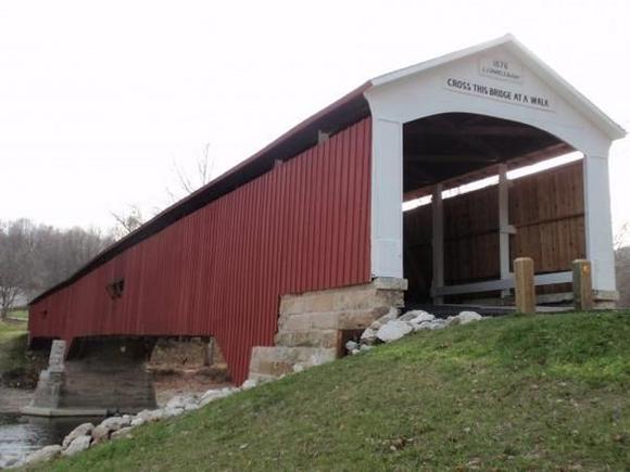 Deer's Mill covered bridge

Heather and I went back to my home turf in Indiana this past fall.  When I take here there, I always have a list of things that I feel she needs to see...so she can better understand who I am.  Covered bridges are all over the place back there...but you just don't see them in Colorado.

Deer's Mill  bridge was built in 1878 and spans 275 ft. across Sugar Creek near Crawfordsville, IN.