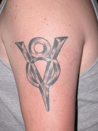 My first tattoo.  Designed to resemble the hood emblem from a '32 Ford.