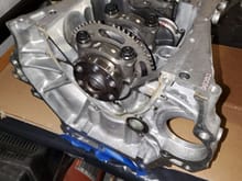 I used the flex plate in a previous photo with two flywheel bolts to turn the motor to install the piston oil squirters. 