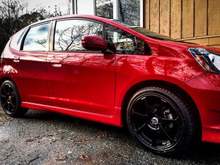 Shoes on! went from stock 16" wheels and tires to 17" gloss black Dragg wheels and Falken tires.  Detailed and waxed.