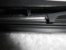 Notice that the metal spines are in the upper seam of the rubber insert . This is important to mount the new insert correctly the proper seam is easy to mix -up.