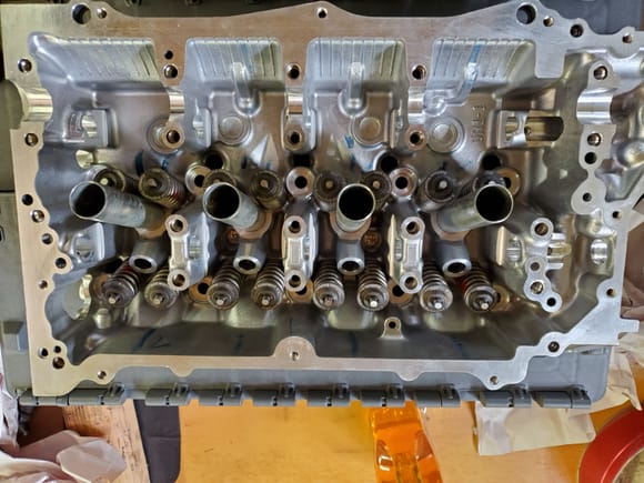Top view. I have never reassembled a vtec valve train. Any pointers? Web cams said buy all new but my donor engine only had 13k miles on it so???