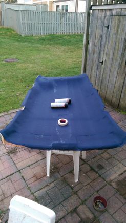 Trial one. I learned that MOST fabrics will be too thin to use for this. You have to find a balance between looks and thickness. On some fabrics, like this one, the glue will just seep right through.
