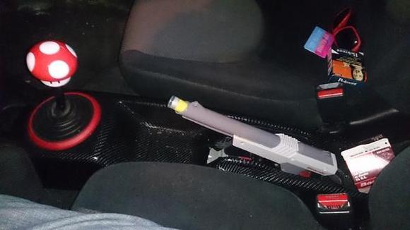 My custom made shifter and ebrake handle. The shifter knob weights almost 1/2 pound, shifts amazingly. The ebrake is a old zapper that I had and moddified to it to fit. And I must say this ebrake is the best mod I have done so far