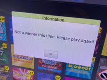 Alas, not a winner!   Am curious, though, what other airports have lotto machines in them?