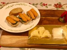 Some pork sausage with Japanese cucumber  open sandwich on walnut wholemeal and cheeses from Les Amis 