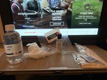 Here’s what you get onboard instead of an amenity kit – a Clean Care kit containing a small water bottle, gloves, hand sanitizer, a mask, and alcohol wipes. These were provided to all passengers pre-departure.