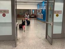 I am so thankful that we didn’t have to pick up our baggage for the overnight layover. We had 4 x 70 pound bags, a moving box, and a bike.