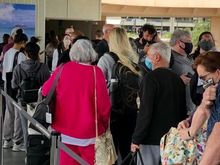 The line resembled a line at a popular Disneyland ride - 3 three rows wide back and forth, back and forth.  No social distancing here. 