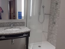 Sink & towel rail  with shower. Wall mounted soap etc