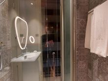 Shower escape to French balcony