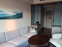 From living room window to entrance hall. Fridge was in the right cabinet across from the nespresso machine