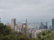Riding the Peak Tram. Octopus card gives you priority. Strangely, large numbers of people were queuing to buy regular tickets. What is that, I don't understand, just embrace the octopus. 