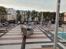 Rooftop pool and terrace / Crowne Plaza Athens