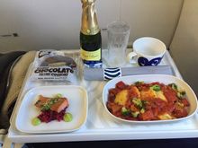 Avocado tortellini for main, but excellent head of cabin lady on this flight again. Busy business class, almost 50 passengers