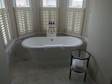 Blinds can be opened for view / tub can hold 2