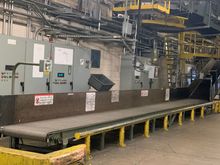 The final stop in the baggage handling system, where bags are unloaded and receive their final scan before heading onto the carousel.  Much more manual than I had envisioned!