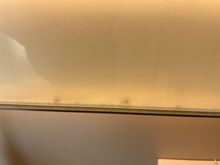 Dust (and maybe bugs) in bathroom mirror