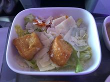 Menu says baby gem lettuce with Caesar dressing ... but it looked more like romaine lettuce.