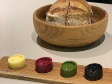 Sourdough bread, salted, beetroot, spinach and charcoal butters