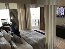 Large bathtub in bedroom corner with parkview