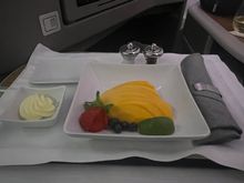 Standard fruit offering. Multiple rounds of the breadbasket were offered. 

One thing to note — all of the trays / juices were placed on the 1A/F ledges for distribution vs. the galley. I’d be less-than-thrilled if I was in row 1. 