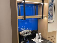 Mini Fridge with Coffee/Espresso machine and a tea kettle in the drawers. 