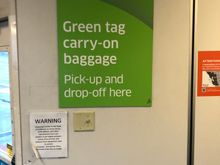 Waiting for my Green Tag bag. 