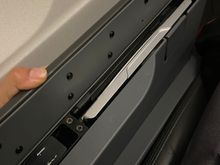Tray table opens if you press the latch. Better design 
