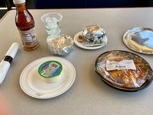I ordered the Vegan Enchiladas, served with salad, a roll, a pudding cup, and an iced tea. The rice was chipotle chili flavored, Southwest vs California flavors. 