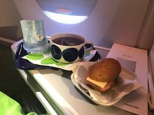 Afternoon tea: a dry bread roll with cheese and ham. There were also cup noodles available.