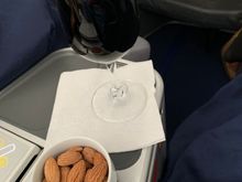 Drink was served on glass and the almond was not cold (not hot, either). Quality of wines was higher than United.