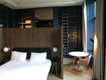It is not a true 1 bedroom suite but more akin to a junior suite due to the partition of the sleeping area versus living area