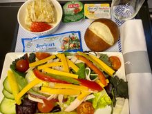 Cold lunch locally catered in BER (Sunday): chicken salad, soft cheese with herbs, pretzel roll, apple crumble cake with créme Anglais.

Veg(an) option was a roasted vegetable salad with a fruit salad, and tapenade in place of the cheese.