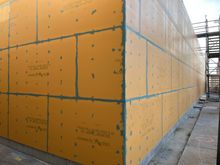 NW corner - solid exterior walls new windows