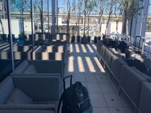 

I had about an hour to kill prior to my flight so I set up shop on the outdoor terrace where the air was fresh and temperature at 77 degrees. 
