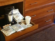 Starbuck coffee and paper/plastic cups. 