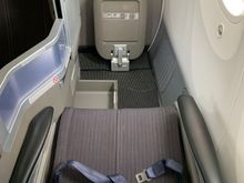 This seat gets a lot of ’stick’ but I actually like it. Apart from staring at someone in the face (takeoff & landing) I like all aspects of the seat, very comfortable.