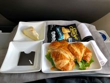 Curry Chicken Salad sandwich.  Pita Chips.  Lemon cheese cake. 