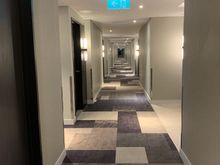 Corridor - new carpet smell and brown