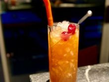 Nui Nui (1937 Version) - Rum (Demerara, Jamaican & cachaça), Orange and Lime juices, Cinnamon and Vanilla syrups, St. Elizabeth Dram, and Jamaican bitters.