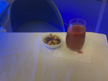 Warm nuts and tomato juice