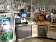 Coffee machine and self service drinks in the Air France Business lounge 