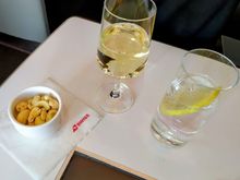 Apéritif with hot nuts in SWISS Business class 