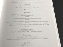 A photo of the Western meal menu; I ended up ordering just the caviar and dessert off of here. They were probably the top things I ate this flight. 