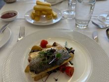 Sea bass main with a side of chips. 