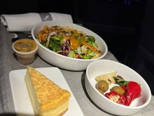 Edamame and Mandarin Orange Slaw Salad  Served with wontons and toasted cashews .
