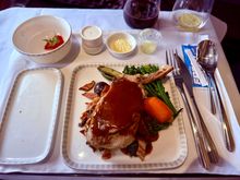 Veal Cutlet EWR-SIN: I love that it was served bone in. A bit overcooked but flavor was great and enhanced by the lardon (ie bits of bacon). Definitely not a healthy choice, and will probably enrage any readers that are members of PETA, but overall quite good and surprised it came out of an EWR catering facility