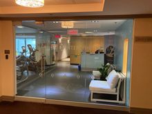 Entrance to health club, there is a person on duty during opening hours