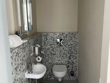One half of the bathroom (toilet only, connected to the living room) 